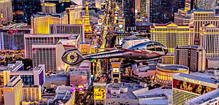 VIP luxury helicopter flying above the Las Vegas Strip with the Las Vegas Strip in the background