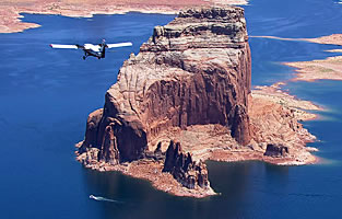 Airplane flying over the Lake Mead enroute to the Grand Canyon with the Colorado River in the background