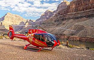 Tour helicopter picnic landing in the Grand Canyon next to the Colorado River